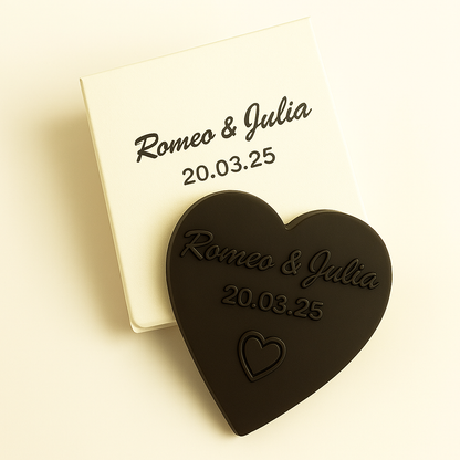 wedding_favors_dark_chocs_heart_inheart_box_lightgold embossed with names of bride and groom in a individually printed box.